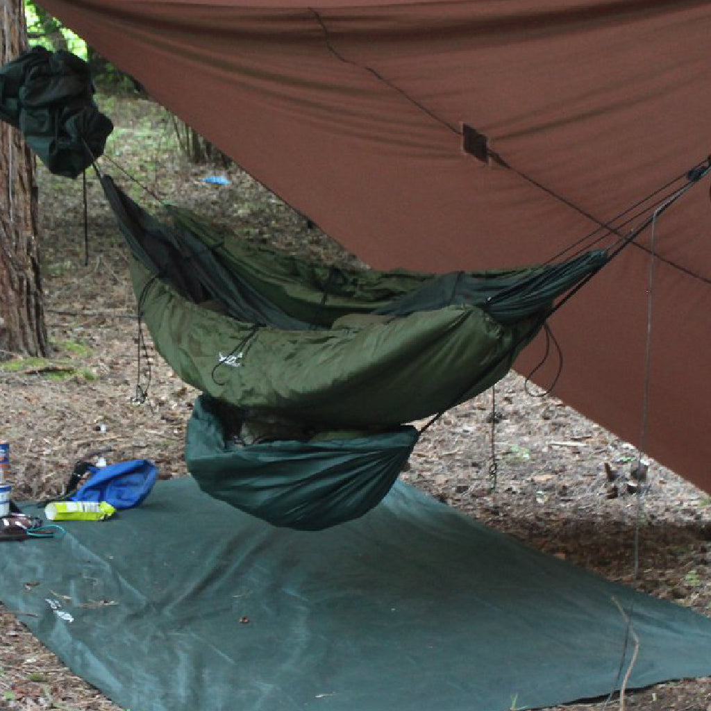 DD Gear Sling in use under a tarp, supporting gear off the ground for hammock campers. DD Gear Sling in use under a tarp, supporting gear off the ground for hammock campers.