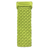 DD Superlight Inflatable Mat in bright green color, compact design for lightweight camping adventures.