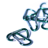 Two green DD Hammocks mini karabiners, ideal for connecting gear and lightweight use, measuring 5cm each.