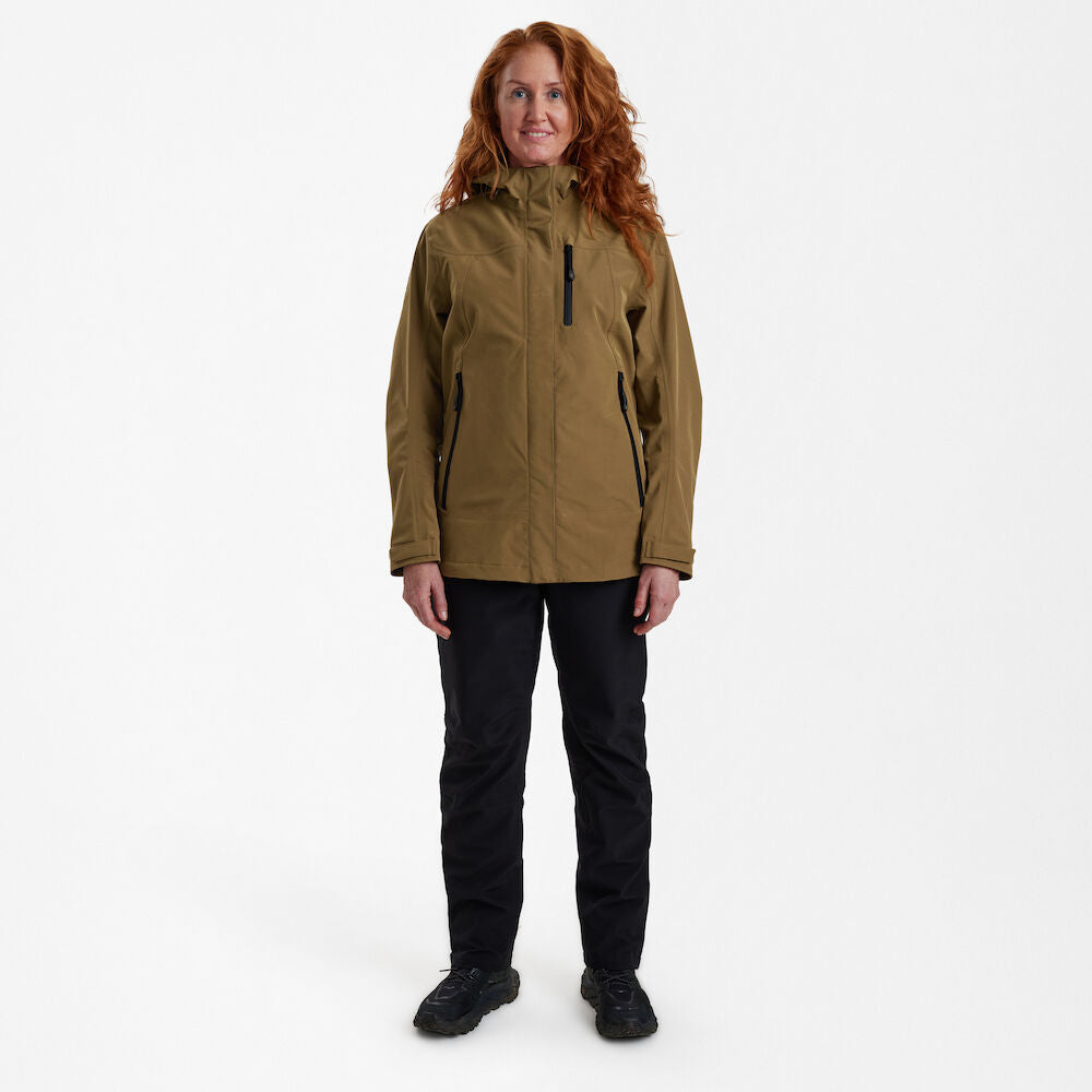 Lady Sarek Shell Jacket with hood in earthy tone, featuring waterproof design for outdoor comfort and protection. Lady Sarek Shell Jacket with hood in earthy tone, featuring waterproof design for outdoor comfort and protection.