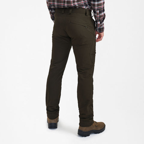 Rear view of Northward Trousers in green, showcasing comfort and practical features for outdoor activities. Rear view of Northward Trousers in green, showcasing comfort and practical features for outdoor activities.