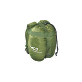 DD Hammocks Underblanket in a compact, green storage bag for outdoor camping comfort.