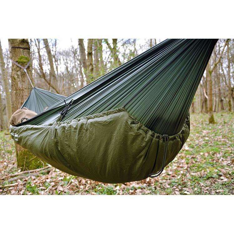 DD Superlight Winter Hammock in a forest setting, showcasing lightweight design for camping by Wylies Outdoor World. DD Superlight Winter Hammock in a forest setting, showcasing lightweight design for camping by Wylies Outdoor World.