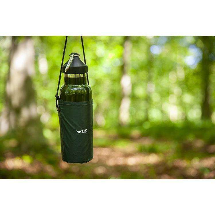 DD Hammocks water bottle holder hanging in a green forest, perfect for outdoor adventures. DD Hammocks water bottle holder hanging in a green forest, perfect for outdoor adventures.
