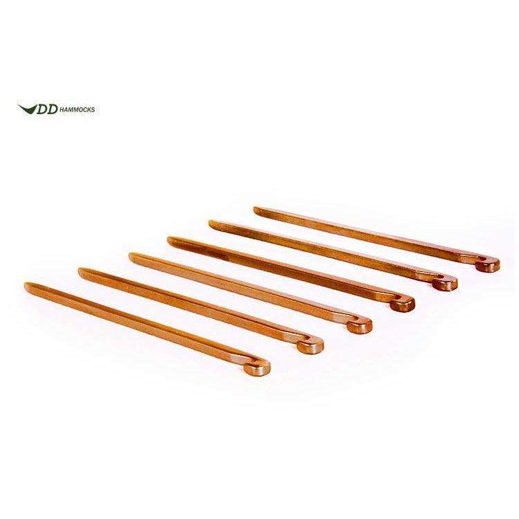 DD Hammocks camping pegs set, perfect for securing tents and hammocks in various terrains for outdoor adventures. DD Hammocks camping pegs set, perfect for securing tents and hammocks in various terrains for outdoor adventures.