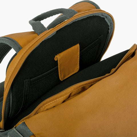 Interior view of the Flug Urban Laptop Backpack showing padded pocket and storage compartments.