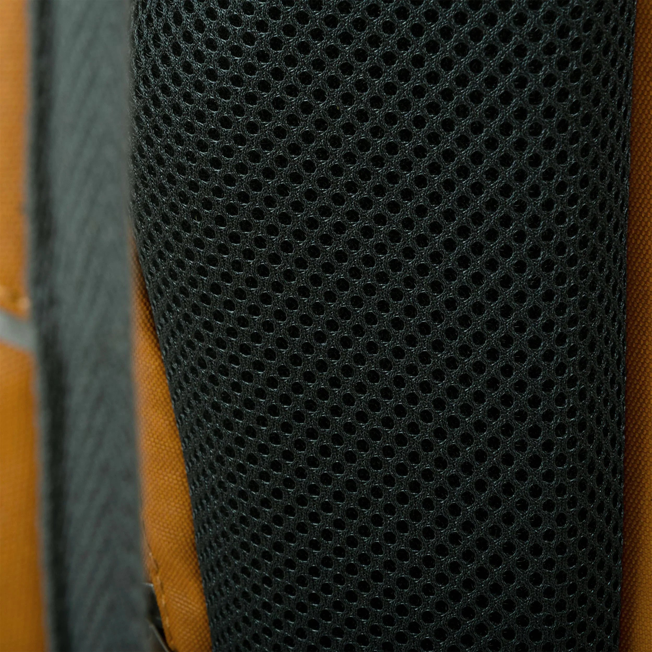Close-up of breathable mesh fabric on the Flug Urban Laptop Backpack, designed for comfort and ventilation.