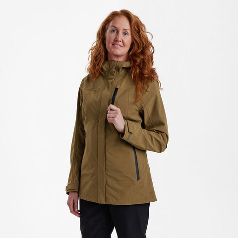 Woman wearing Lady Sarek Shell Jacket with hood, showcasing its waterproof and breathable features for outdoor activities.