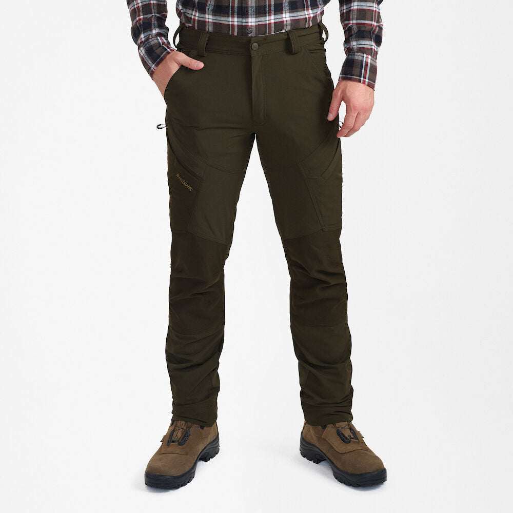 Northward Trousers by DEERHUNTER in dark green, designed for comfort and functionality during outdoor activities.