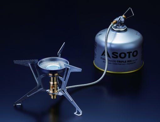 Portable gas stove with SOTO brand gas canister on a dark background