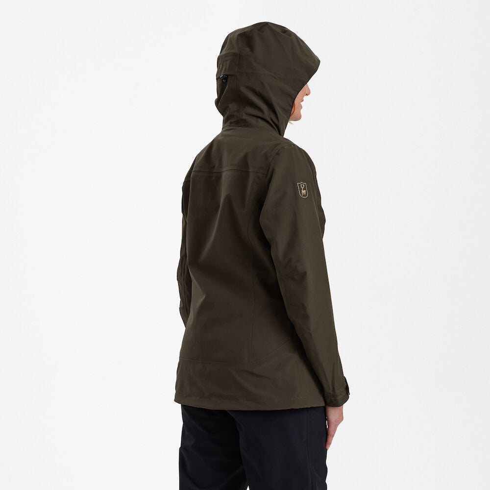 Lady Sarek Shell Jacket with hood in dark green, showcasing waterproof and breathable features for outdoor activities.