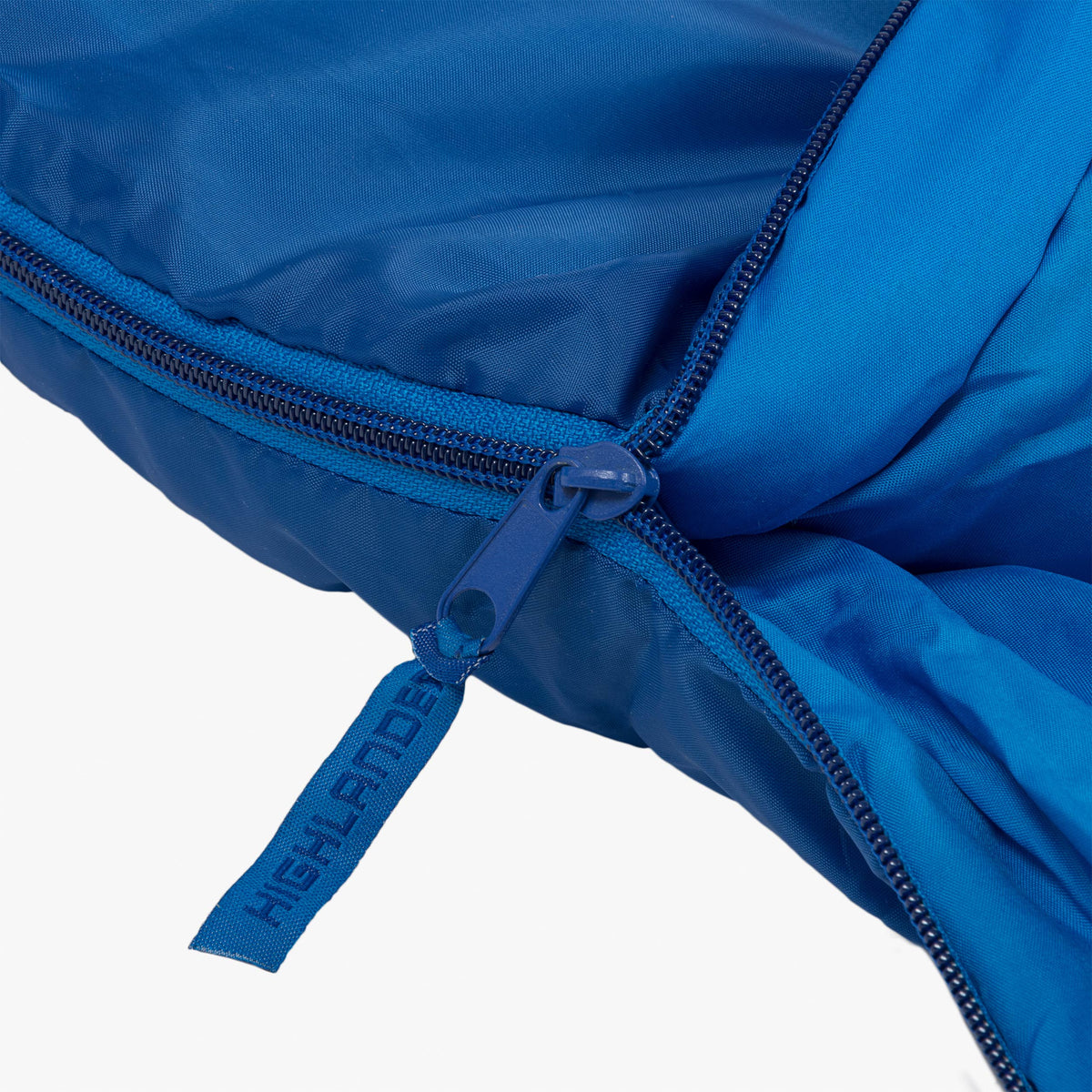 Close-up of the zipper and label on the Sleepline 250 Mummy Sleeping Bag in blue fabric