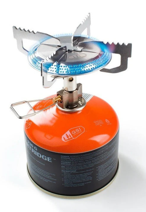 GSI Glacier single burner gas stove attached to orange gas canister showing compact blue and black design