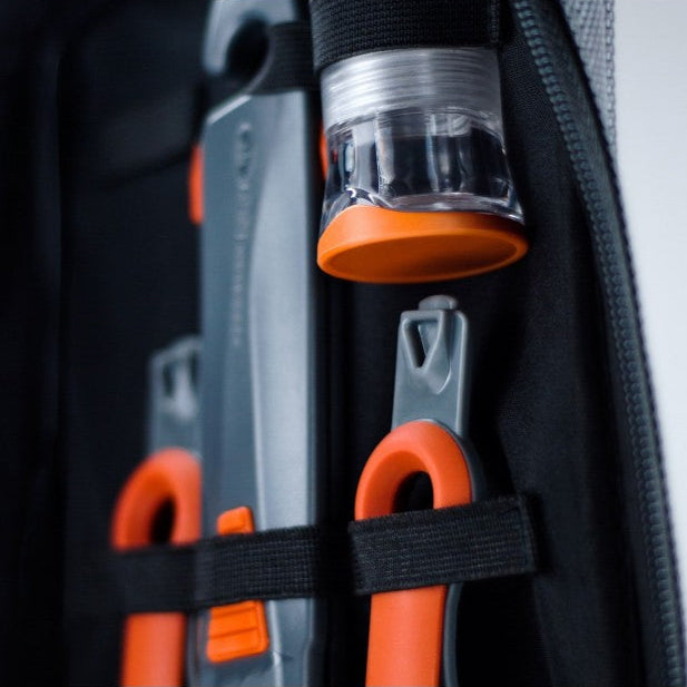 GSI camping cooking utensils being used for vehicle camping meal preparation with camper van